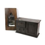 Oak and iron inset table cabinet, with cupboard door beside three drawers, H30 W51 D20 cm,