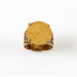1907 1/2 sovereign ring, in an ornate 9 ct rose gold ring mount, size W