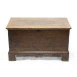 Oak blanket box, the hinged lid over planked sides and bracket feet, H58 W96 D48 cm