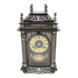 Late Victorian ebony and ivory inlaid table clock, the moulded top with metal finials over