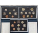 3 ROYAL MINT BLUE CASED YEARLY COIN SETS COMPRISING DATES 1983 1988 AND 1989