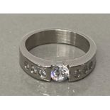 A STEEL AND CZ SET BAND RING SIZE P 1/2