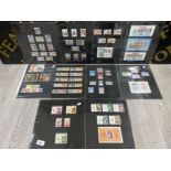 10 SHEETS OF UNUSED POSTAGE STAMPS INCLUDES CANADIAN, BARBADOS, QUEENS SILVER JUBILEE ETC