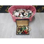 A LARGE BAG CONTAINING A LARGE QUANTITY OF COSTUME JEWELLERY SOME STILL WITH PACKAGING ON