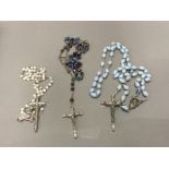 THREE SETS OF ROSARY BEADS OF VARIOUS DESIGNS