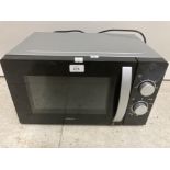 AN AMBIANO MICROWAVE IN BLACK