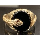 9CT YELLOW GOLD BLACK ONYX SNAKE RING WITH TWO SMALL GARNETS SET FOR THE EYES SIZE V 4.6G GROSS