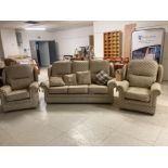 A MODERN THREE PIECE SUITE COMPRISING THREE SEATER SOFA AND TWO ARMCHAIRS IN BEIGE FABRIC