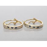 14CT YELLOW GOLD DIAMOND AND SAPPHIRE HALF HOOPS COMPRISING OF THREE ROUND CUT DIAMOMDS SET IN A