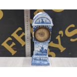 A 20TH CENTURY BLUE AND WHITE DELFT MINATURE LONGCASE CLOCK DATED DEC 5 '31 HEIGHT 22 CM