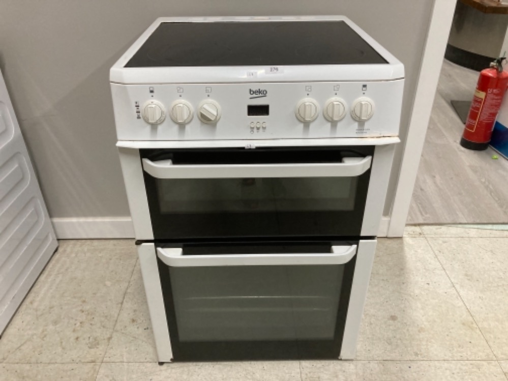 A BEKO ELECTRIC OVEN IN WHITE