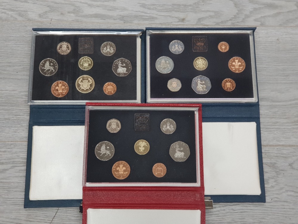 3 ROYAL MINT UK PROOF SETS DATING 1983 1985 AND 1986 ALL IN ORIGINAL CASES WITH CERTS