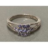 A SILVER ELEVEN STONE TANZANITE CLUSTER RING SIZE P 1/2 3.6G GROSS