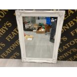 A WHITE PAINTED SWEPT WALL MIRROR WITH GLITTER DETAILING 90 X 65CM