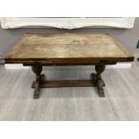 A LARGE OAK REFECTORY STYLE DINING TABLE WITH PULL OUT LEAVES 212 X 74 X 85CM