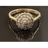 9CT YELLOW GOLD AND DIAMOND CLUSTER RING COMPRISING OF THREE ROWS OF SMALL ROUND CUT DIAMONDS IN A