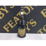 A 75CL BOTTLE OF 1980S DOM PERIGNON CHAMPAGNE