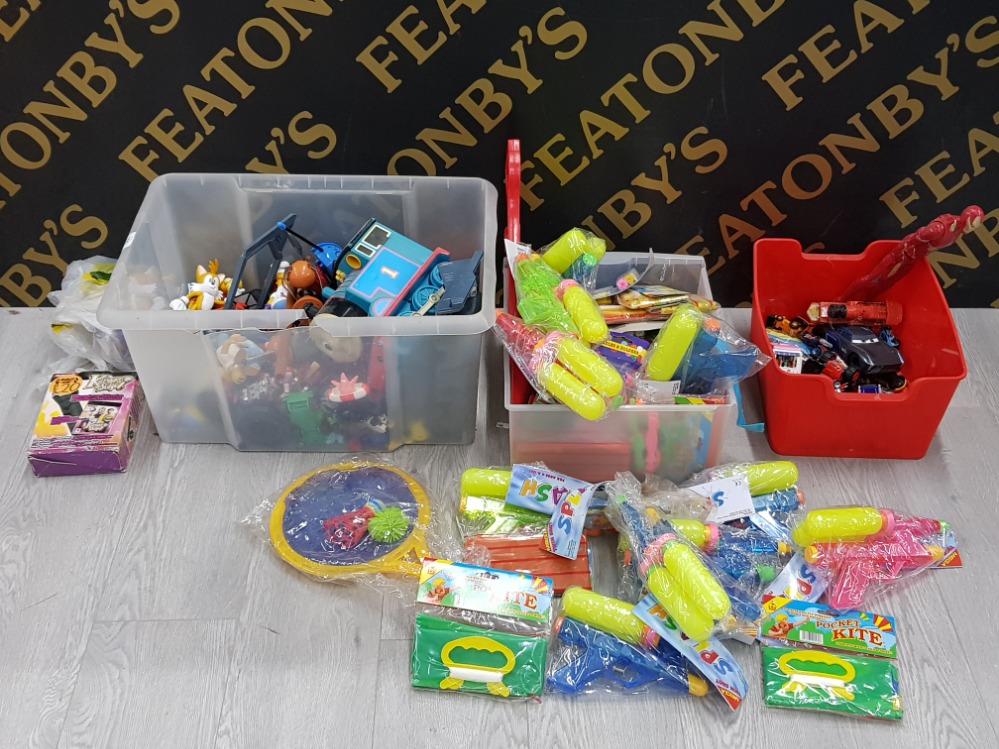 KIDS TOYS INCLUDES WATER GUNS, POCKET KITES NEW IN PACKS, DIE CAST VEHICLES AND SIMPSONS FIGURES