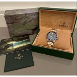 1996 18CT YELLOW GOLD AND STEEL ROLEX SUBMARINER BLUE DIAL ORIGINAL BOX AND MANUAL IN EXCELLENT