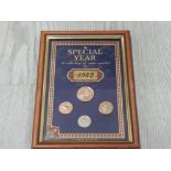 A FRAMED COLLECTION OF UK ROYAL MINT COINS MINTED IN 1942 'A SPECIAL YEAR'