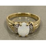 9CT GOLD OPAL AND DIAMOND RING SIZE M 2.4G
