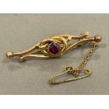 9CT GOLD AMETHYST ORNATE BROOCH 2.4G