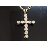 HALLMARKED 9CT GOLD CRUCIFIX WITH INLAID WHITE STONES 4.3 GRAMS GROSS ON A 20 INCH WAISTED CABLE