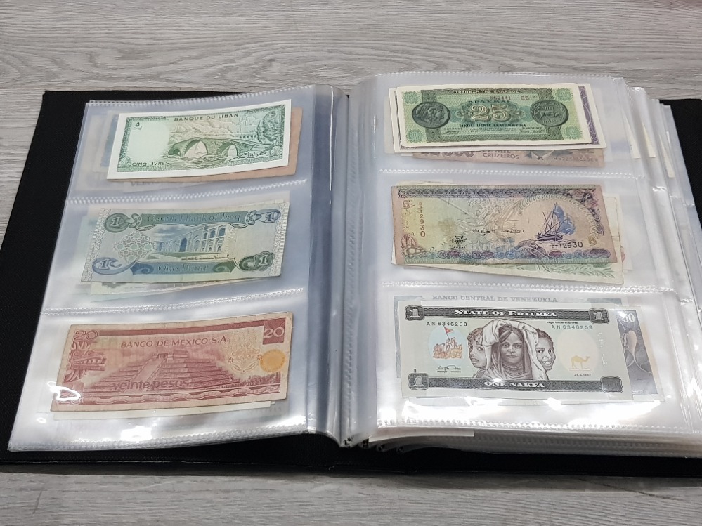 AN ALBUM CONTAINING MISCELLANEOUS WORLDWIDE BANKNOTES INCLUDES BANQUE DU LIBAN STATE OF ERITREA