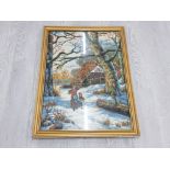 A LARGE FRAMED TAPESTRY OF A WOMAN AND CHILD WINTER SCENE