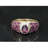 9CT YELLOW GOLD PURPLE STONE AND DIAMOND CLUSTER RING SIZE N GROSS WEIGHT 3.1G