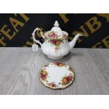 A RARE ROYAL ALBERT TEAPOT STAND TOGETHER WITH MATCHING TEAPOT