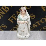 A LARGE 19TH CENTURY STAFFORDSHIRE FIGURE OF QUEEN VICTORIA IN HER WEDDING DRESS 44CM HIGH
