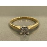 9CT GOLD DIAMOND CLUSTER SOLITAIRE RING FEAT SEVEN ROUND BRILLIANT CUT APPROX .5CTS