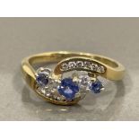 9CT GOLD TANZANITE AND DIAMOND TWIST STYLE CLUSTER RING SIZE J 2.8G