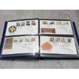AN ALBUM CONTAINING MISCELLANEOUS FIRST DAY COVERS INCLUDES VICTORIAN BRITAIN SCOTTISH HERALDRY