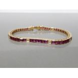 5CT NATURAL RUBY LINE BRACELET WITH DIAMOND SPACERS SET IN 18CT YELLOW GOLD GROSS WEIGHT 18.5G
