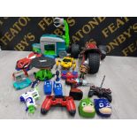 A BOX OF MISCELLANEOUS TOYS INCLUDES PLAYSTATION 4 REMOTE CARS ETC