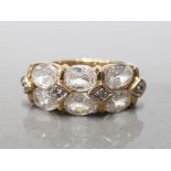 9CT YELLOW GOLD LADIES CUBIC ZIRCONIA SET CLUSTER RING COMPRISING OF 6 OVAL SHAPES STONES SET IN 2