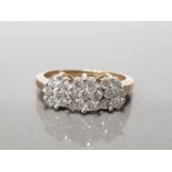 9CT YELLOW GOLD LADIES DIAMOND CLUSTER RING FEATURING 3 CLUSTERS OF DIAMONDS IN A FLOWER SETTING