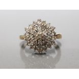 9CT YELLOW GOLD DIAMOND CLUSTER RING FEATURING 37 BRILLIANT ROUND CUT DIAMONDS CLAW SET AROUND THE