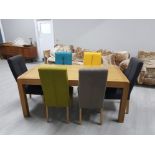 BEAUTIFUL SOLID OAK DINING TABLE AND 6 MULTI COLOURED CHAIRS 1.8m x 90cms x 78cms