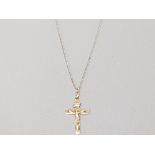 9CT YELLOW GOLD CRUCIFIX 3CMS WITH BALE 0.7G ON SILVER GILT 18" CHAIN
