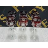 A SET OF 6 BOHEMIAN RUBY CUT DRINKING GLASSES