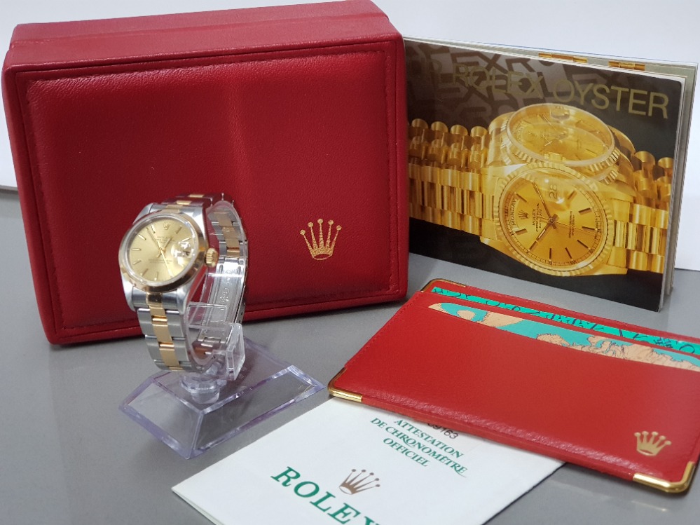 ROLEX LADIES 26MM ROLEX DATEJUST YELLOW GOLD AND STAINLESS STEEL CHAMPAGNE DIAL WITH GOLD BATON