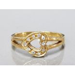 18CT YELLOW GOLD HEART SHAPED DIAMOND SET RING SIZE L GROSS 3.1G