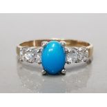 9CT YELLOW GOLD LADIES TURQUOISE AND CZ RING COMPRISING OF A TURQUOISE STONE SET IN THE CENTRE