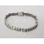 STERLING SILVER AND CZ LINE BRACELET GROSS 18.7G