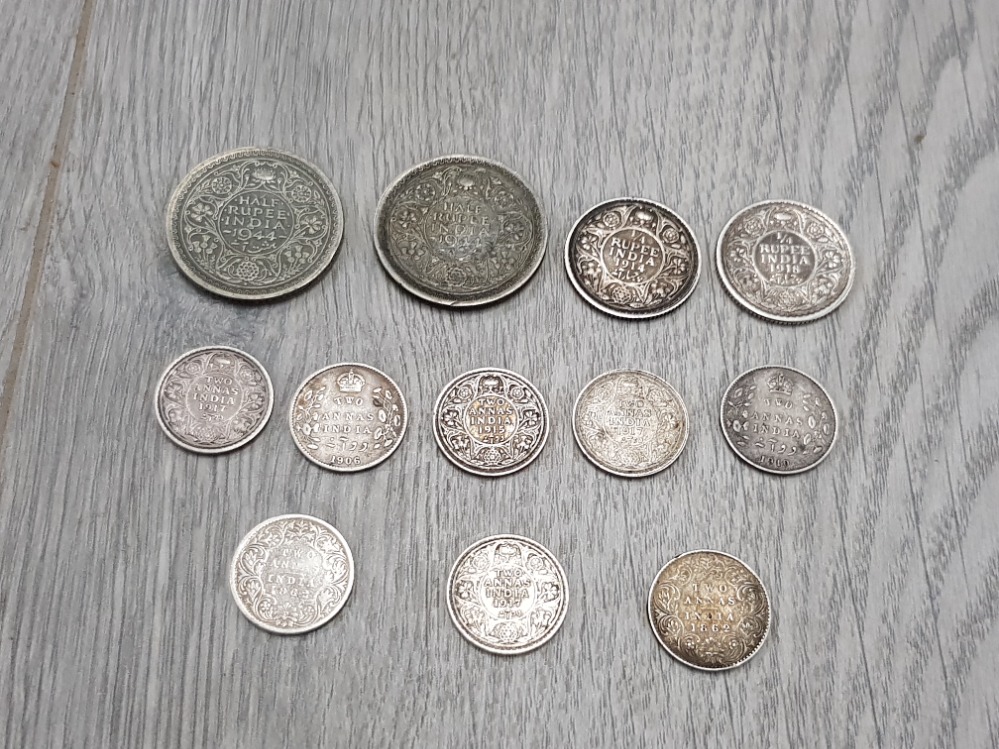 SILVER EARLY INDIA COINS TO INCLUDE 2 1944 1/2 RUPEES 2 1/4 RUPEES AND 8 ZANNAS PRE 1918 INCLUDING