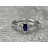 18CT WHITE GOLD SAPPHIRE AND DIAMOND RING 1/2CT 1.7G SIZE M