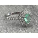 18CT WHITE GOLD PEAR SHAPE EMERALD WITH DOUBLE BORDER OF 36 DIAMONDS IN CLUSTER AND 10 DIAMONDS ON